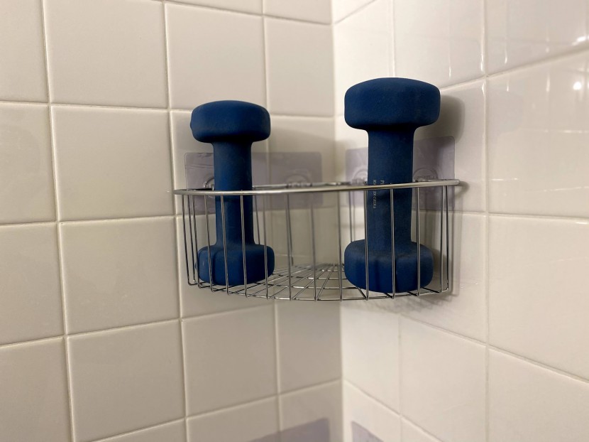 shower caddy - we weighed down the shelves of each caddy with 10 pounds of weight...