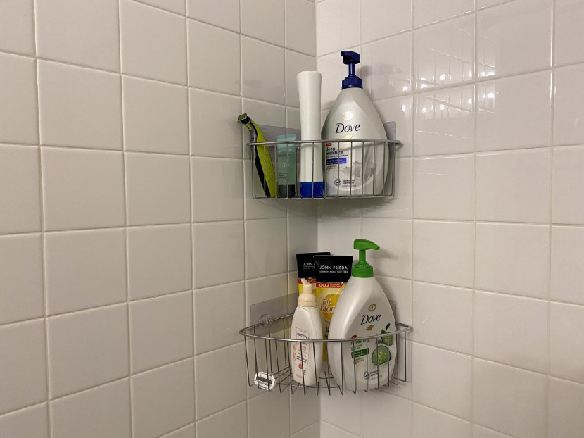 shower caddy - really stable adhesive pads and deep baskets make this an appealing...