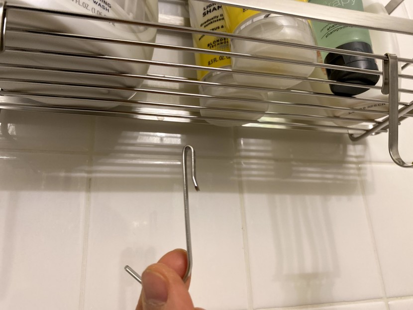 shower caddy - hooks, especially ones that can attach almost anywhere on the caddy...