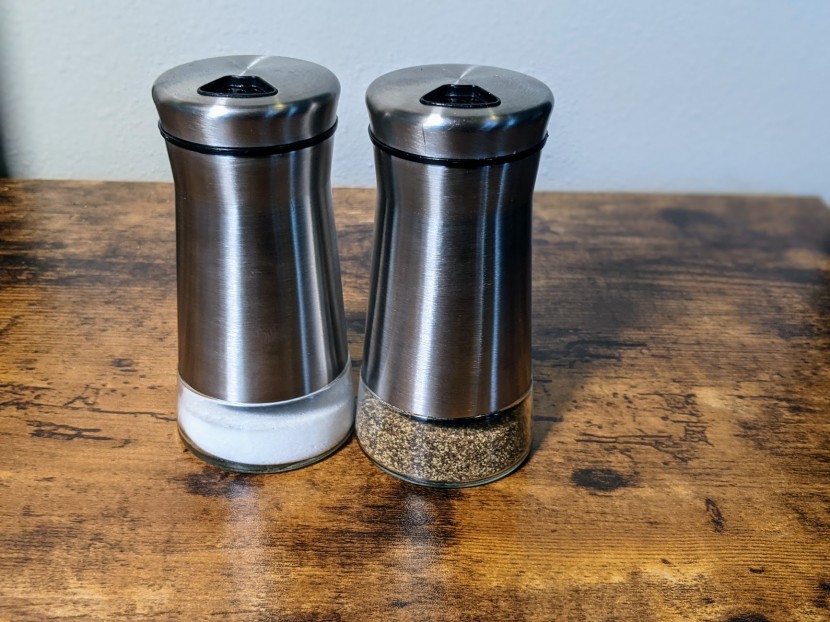 salt and pepper shakers - these stainless and glass shakers are a classy addition to any table.