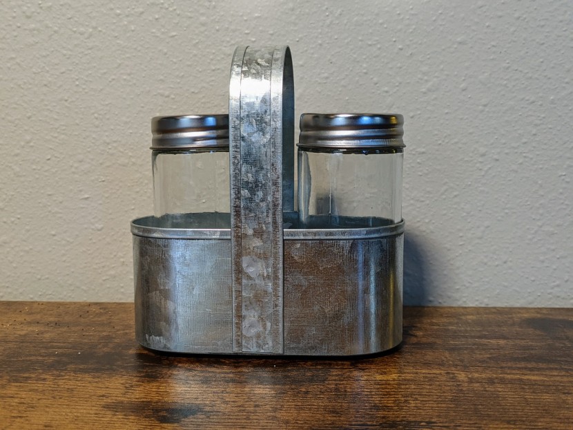 salt and pepper shakers - one of two sets that come with a carrying caddy.