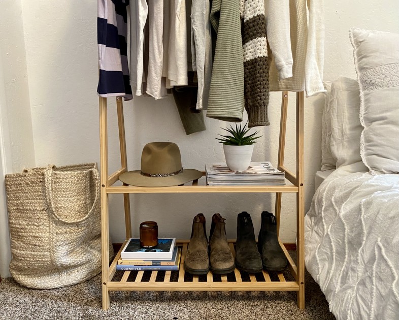 clothes rack - several garments fit on the top rack of the finnhomy bamboo rack...
