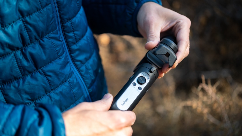 smartphone gimbal - the hohem isteady x has a short handle that keeps your phone low to...