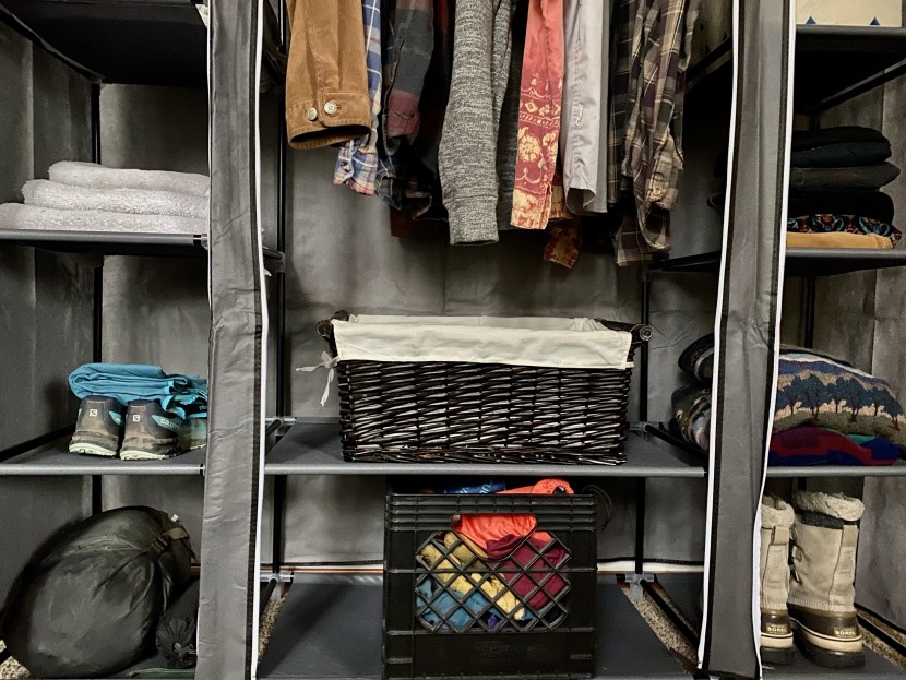 clothes rack - with 13 storage compartments and drop down closet covers, the...