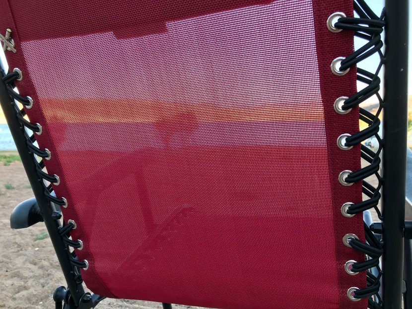 lawn chair - the mesh back of the amazon basics foldable rocking chair kept...