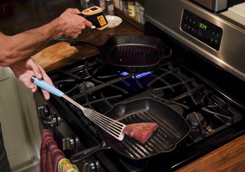 ensuring even heat on side-by-side cast iron searing comparisons...