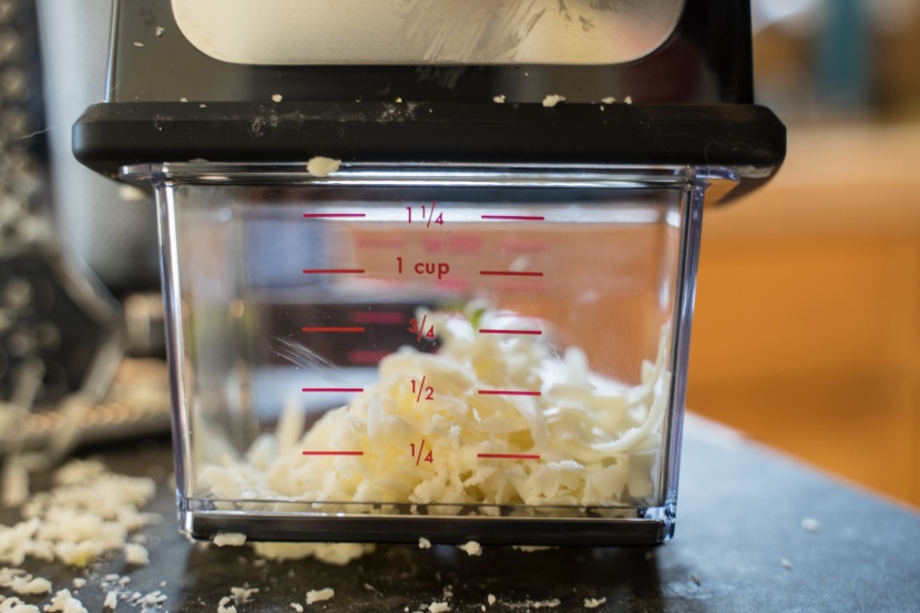 grater - the measuring container included with the oxo model lets you know...