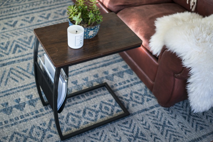 end table - a c-shaped frame and included storage bag make this a unique and...