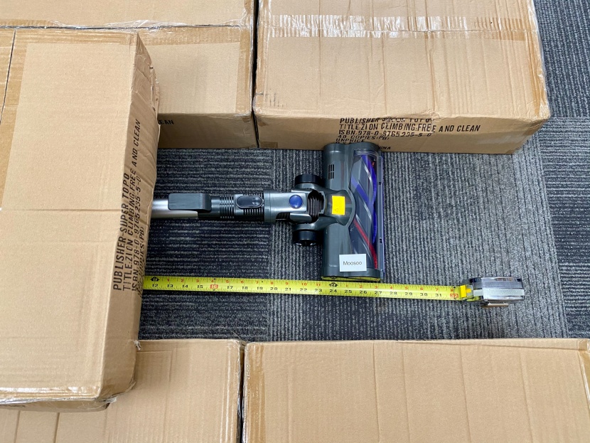 moosoo xl-618a - the moosoo has a decently long reach under furniture, seen here with...