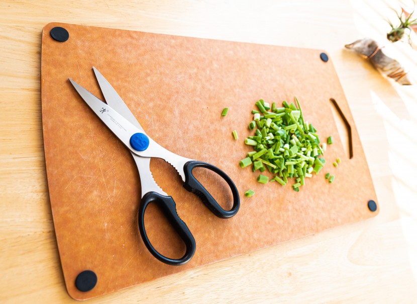 kitchen shears - the j.a. henkels international take-apart shears resting on a...