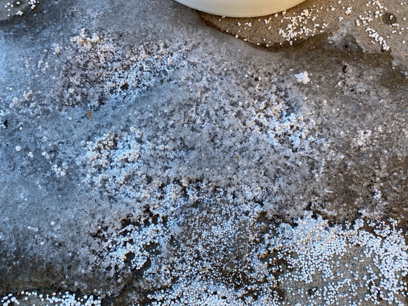 ice melt - calcium chloride and magnesium chloride attack ice with an...