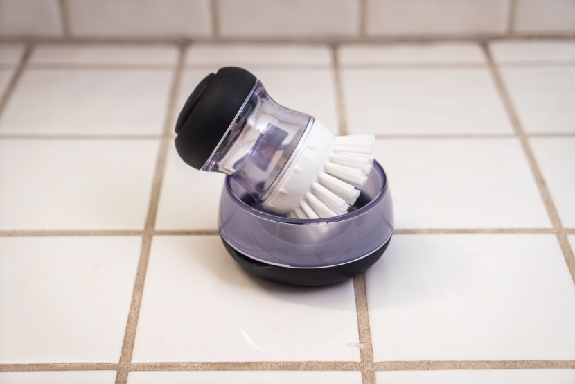 cleaning brush - a palm brush with the power of a full-size brush and a handy storage...