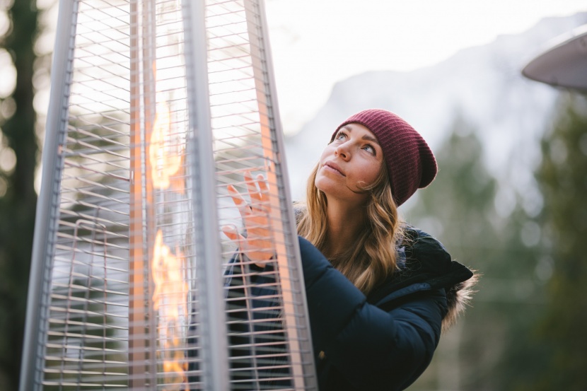 outdoor heater - the avenlur dazzles with its center flame encased in a 4-foot tall...