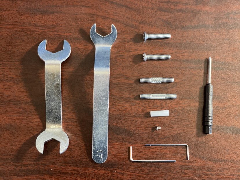 some lamps come with tools for assembly and extra parts, just in case.