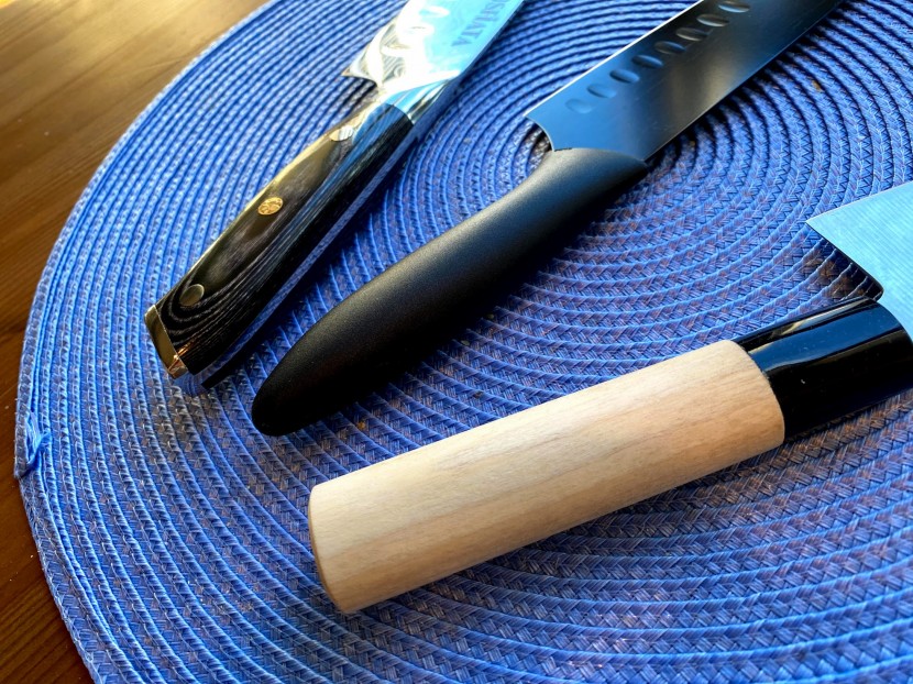 santoku knife - three different handle materials. top: wood composite (waterproof...