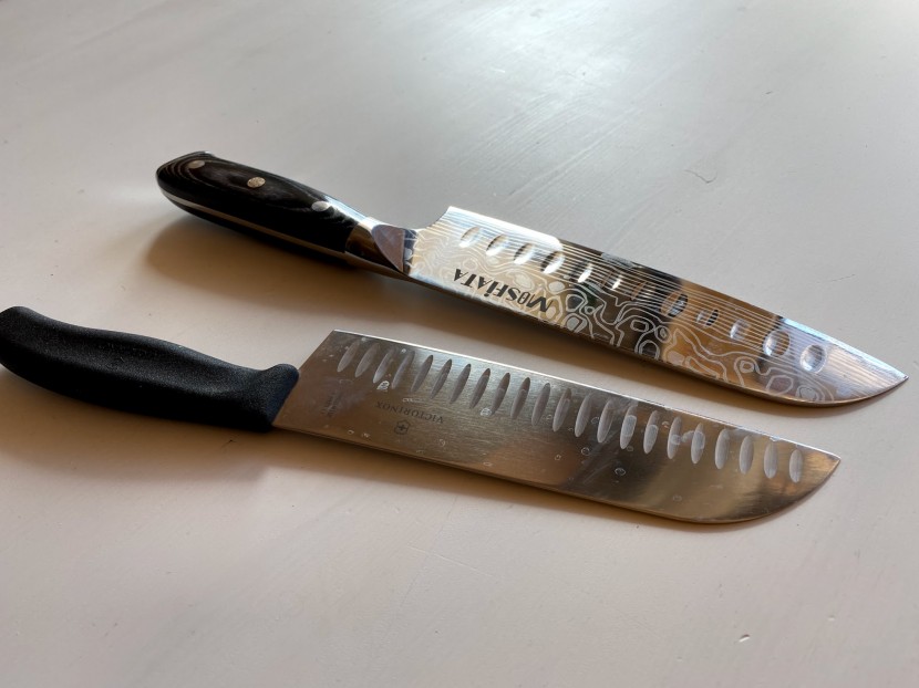 santoku knife - forged blades, like the one on top, tend to be more comfortable to...