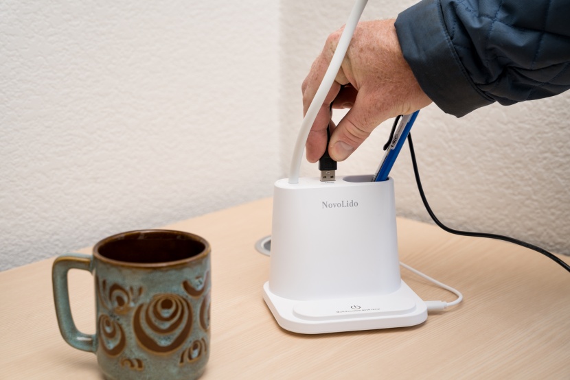 desk lamp - this model has a usb plug, a cell phone stand, and a pen holder.