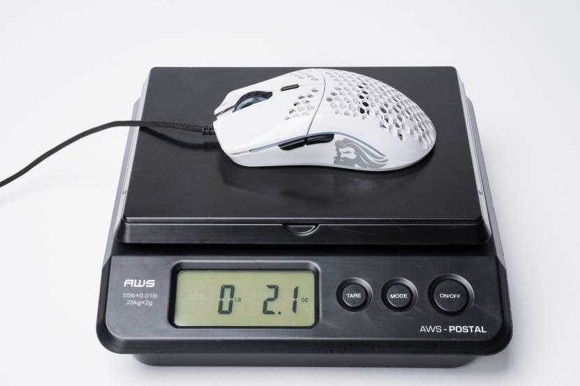 a couple ultralight mice weighed in at 2.1 ounces (59 grams), which...