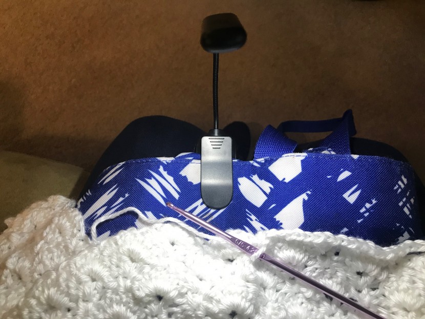 the deep clip on the topolek allows this book light to be used for...