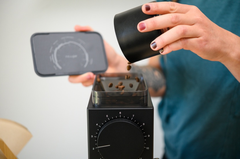 fellow ode - the inside of the ode&#039;s hopper lid displays a grind size guide.