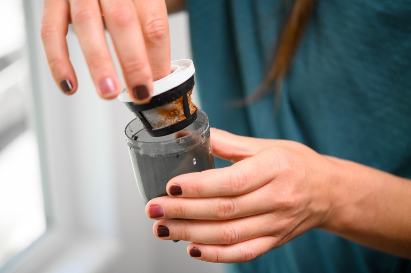 handheld vacuum - you can empty the dust bin once the filter has been removed.