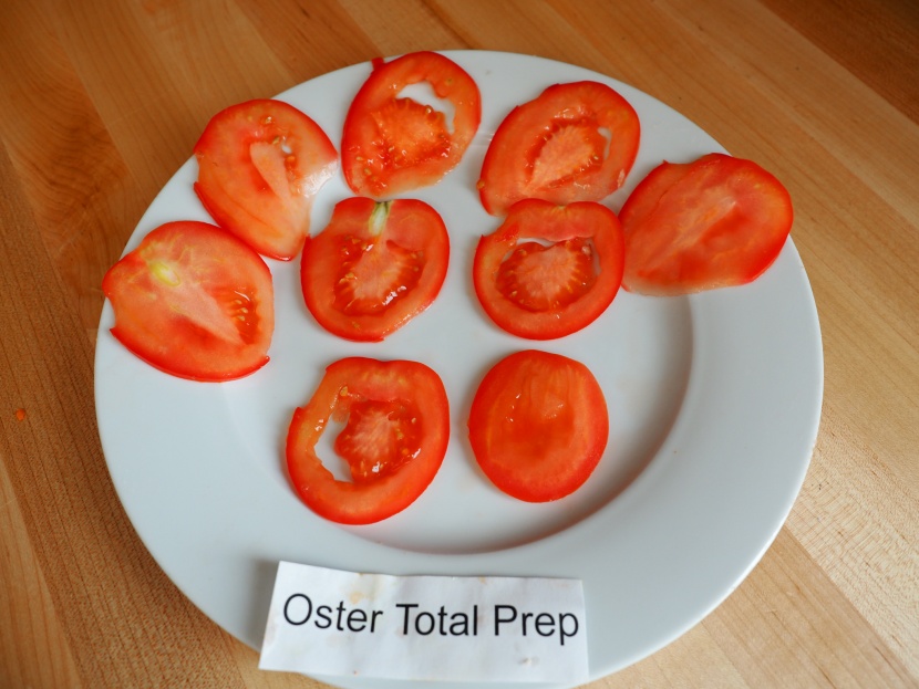 oster total prep 10-cup - we were surprised at how cleaning this model sliced tomatoes.