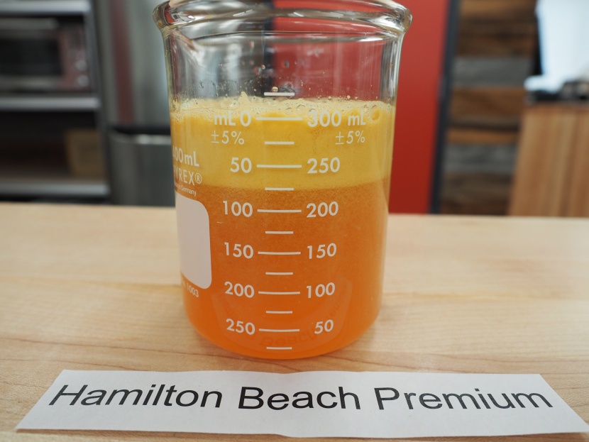 juicer - the big mouth premium produces a good yield of apple juice compared...
