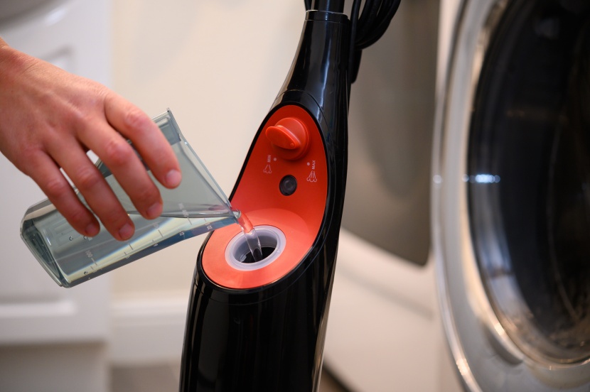 o-cedar microfiber - filling the o-cedar isn't hard, but the opaque tank makes it...