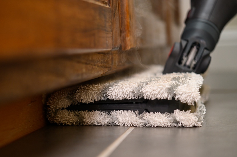 steam mop - the genius slides under cabinets quite easily.