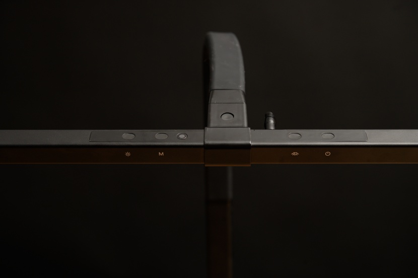 desk lamp - the built-in, intelligent light sensor is the button to the left of...