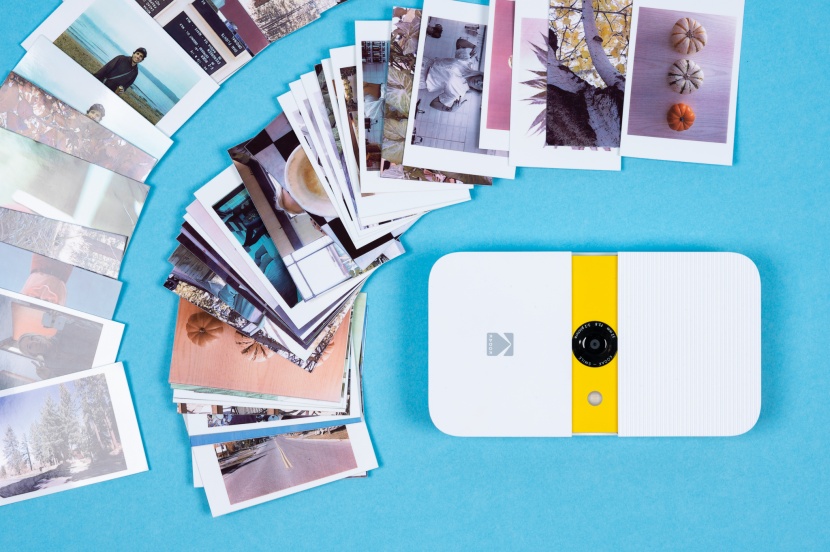 instant camera - the kodak smile instant print creates smaller photos that are...