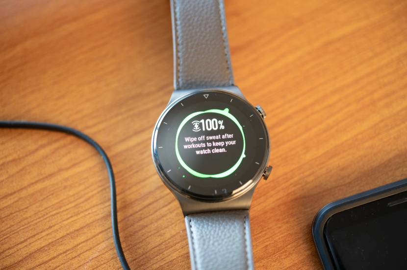 huawei gt 2 pro - a charge level and care tip are clearly visible on the display of...