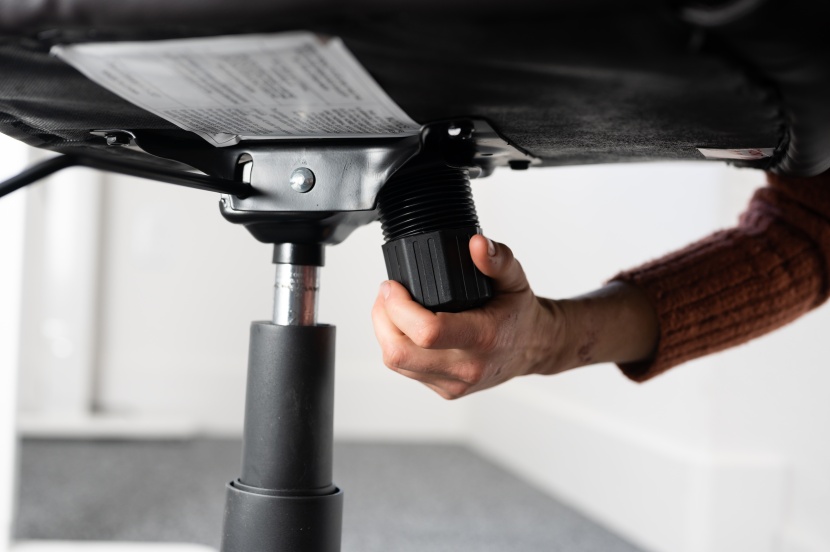 amazon basics padded swivel - the tensioner knob is difficult to reach and operate while sitting...