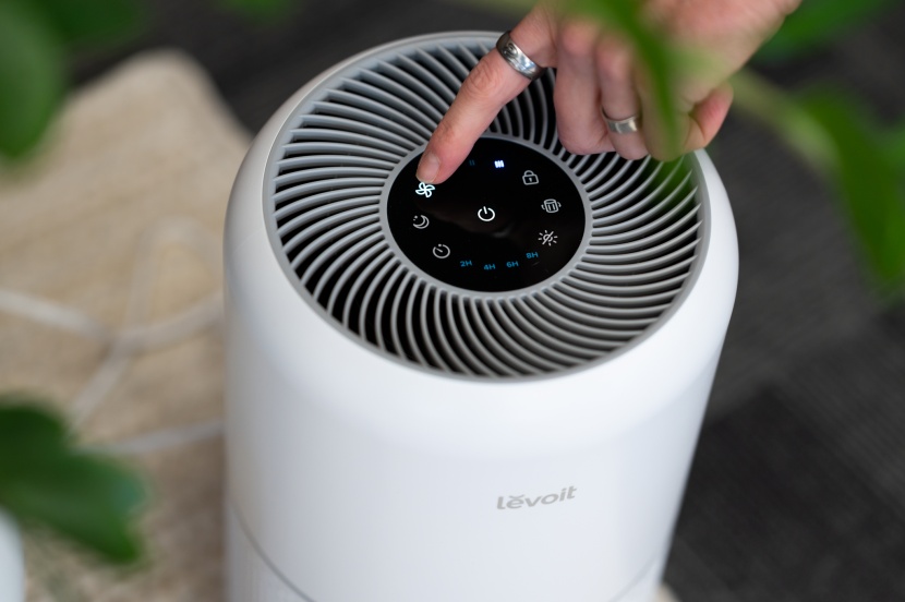 levoit core 300-p - a simple, circular control panel on top of the levoit core 300-p air...