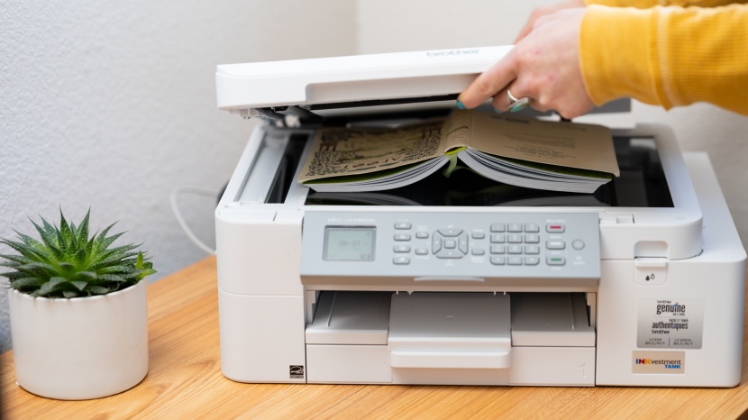 home printer - the scanner's hinges allow for the ability to lift the rear high...