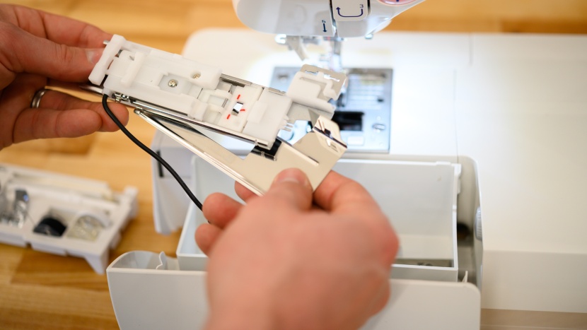 this sewing machine has a plate and clamp to use with filmy...