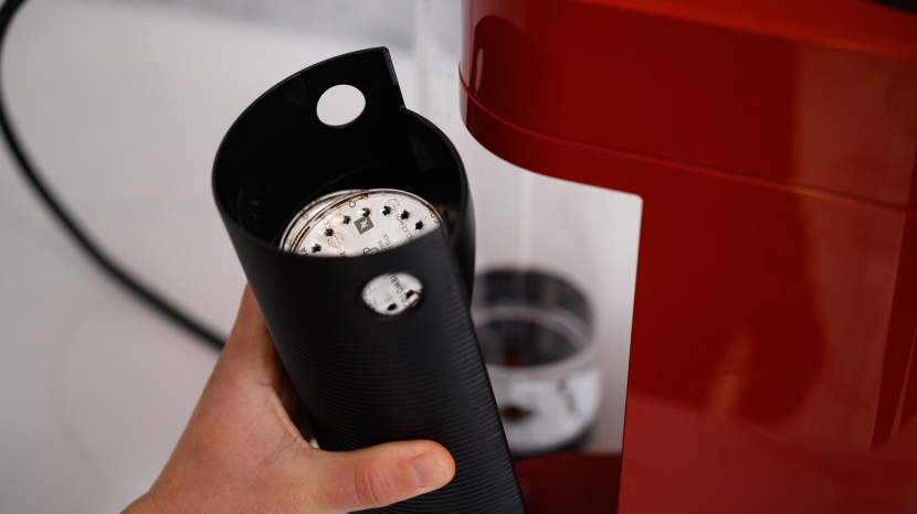 nespresso vertuoplus - removing spent pods from the back of this brewer is the only...