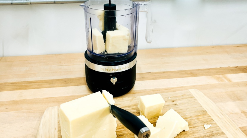 kitchenaid 5-cup - cheese was sliced into half-inch cubes before processing.