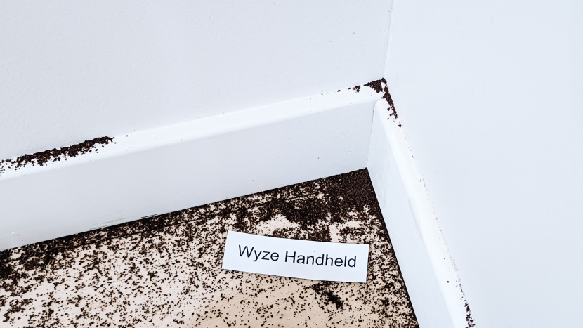 wyze handheld - the wyze struggled with the baseboard test, missing most of the dirt...