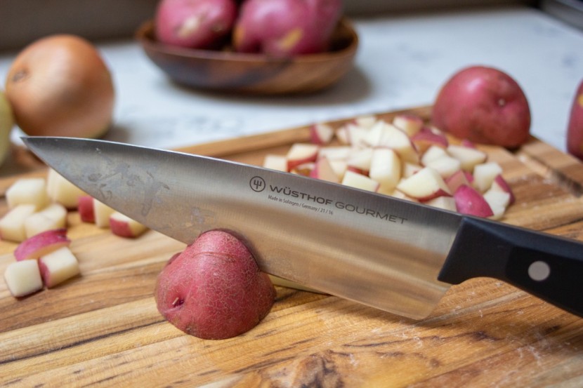 wusthof gourmet 10 piece - the balance is right at the end of the handle so you do less work...