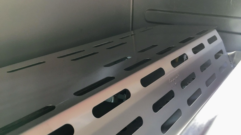 a heat distribution cap sits over that burner to help evenly heat...