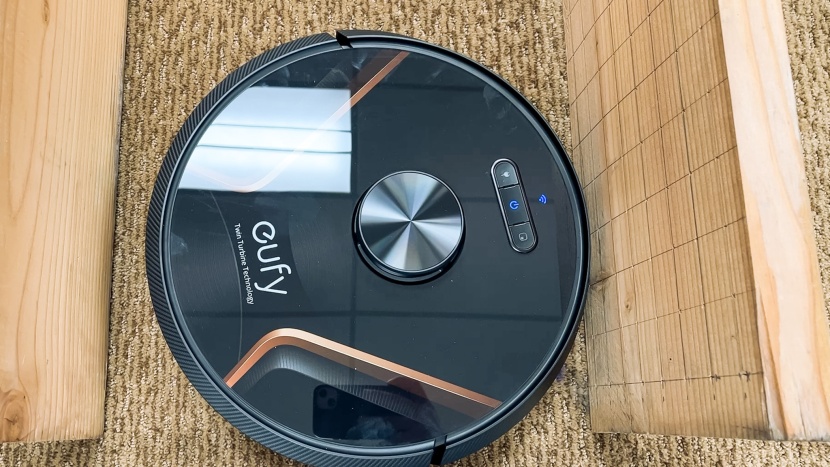 eufy robovac x8 hybrid - the x8 hybrid in a narrow hallway.