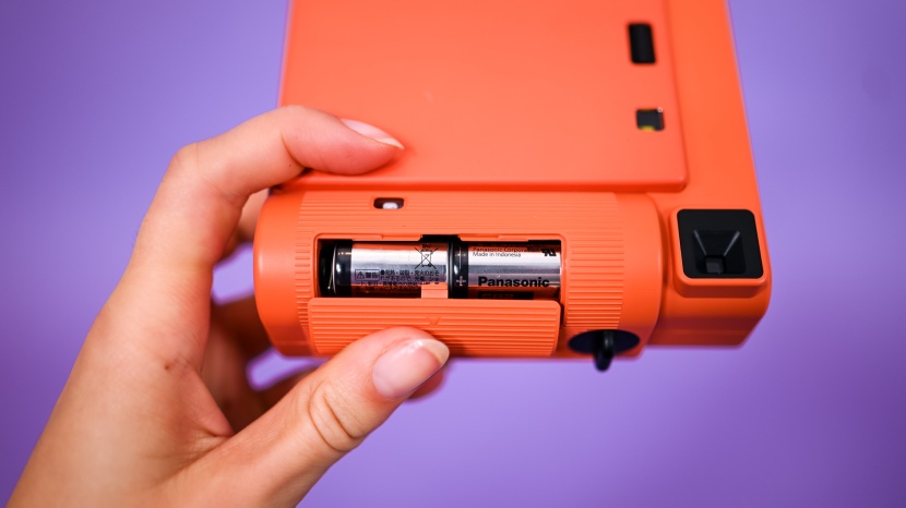 fujifilm instax square sq1 - the battery column has a texturized grip to assist with stability...