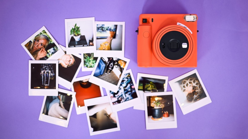 instant camera - the square images produced by this camera display rich vibrant...