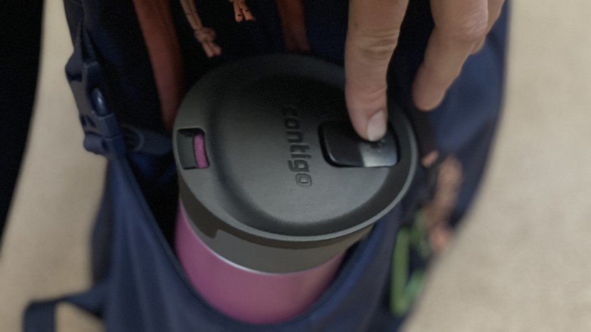 tumbler - the contigo autoseal only releases liquid while you press the...