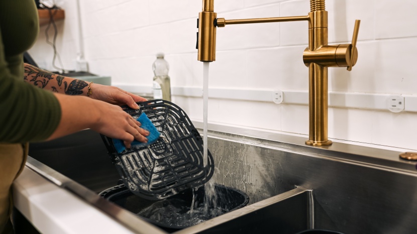 instant vortex plus clear cook - the clear cook tray has a lot of holes in it, so washing it...