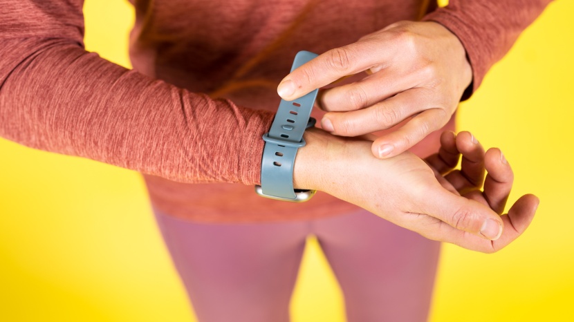 fitbit versa 4 - putting on the versa 4 is a breeze.