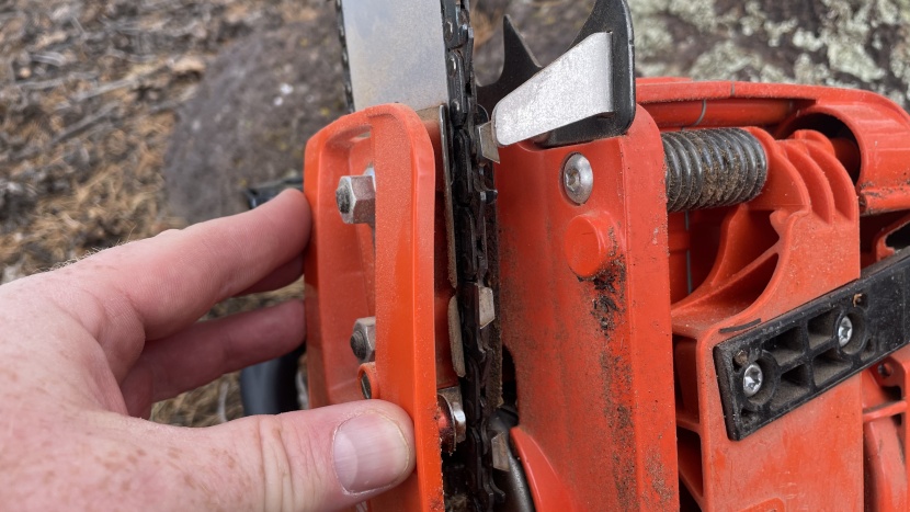 the chain guide on the underside of the echo cs 590 keeps the chain...