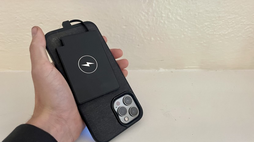 clutch v3 iphone - compared to an iphone 13 pro this charger seems to be tiny in...