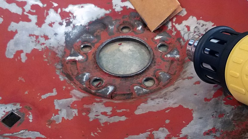 heating paint with a heat gun for stripping and paint preparation.